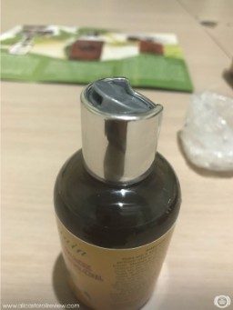 Flipped press cap of Fountain Oil castor oil bottle